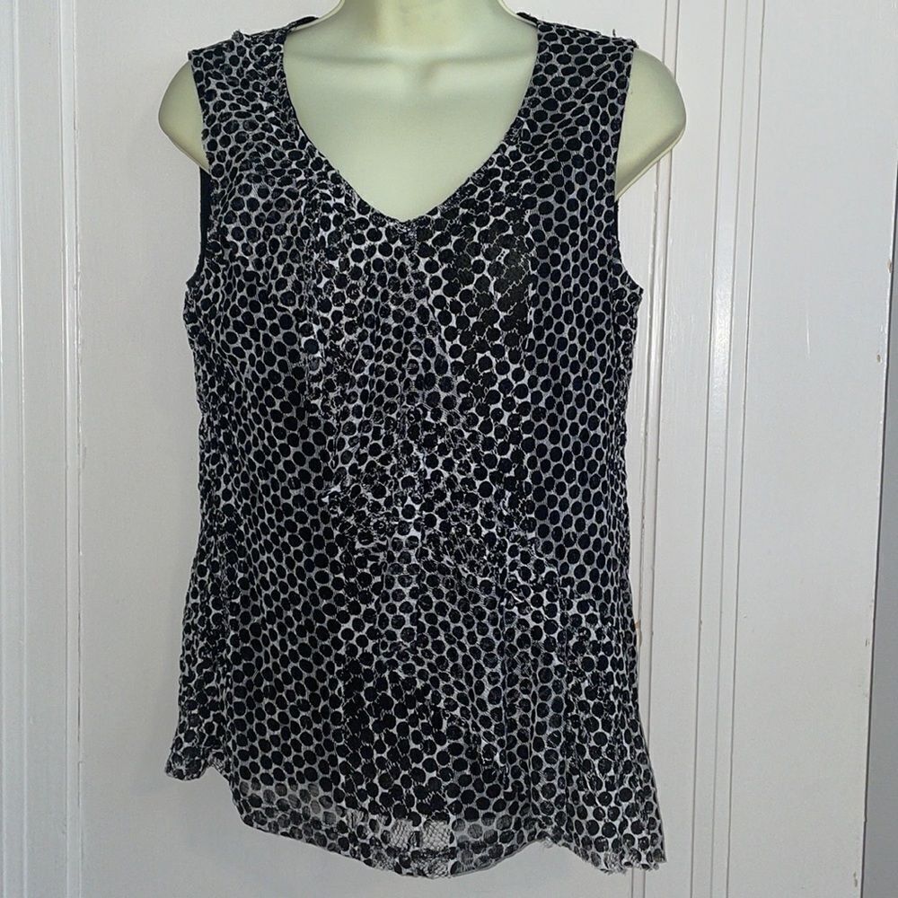 Chico’s white with black‎ polka dots sleeveless blouse with ruffle across front